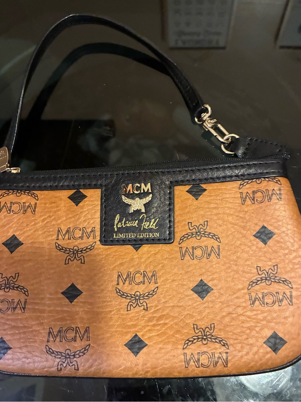 MCM Cognac Visetos Monogram Wristlet with Black Trim